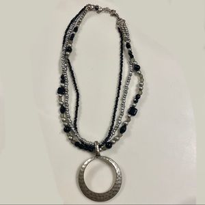 Three strand necklace with removable pendant